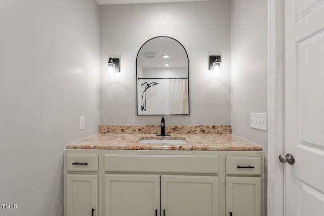 1803 Saint Paul Ave, Fayetteville, NC 28304 - bathroom featuring visible vents, vanity, and a shower with shower curtain