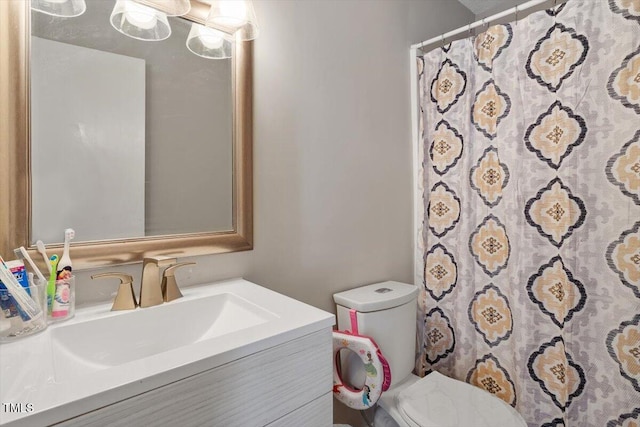 1803 Saint Paul Ave, Fayetteville, NC 28304 - bathroom featuring a shower with shower curtain, toilet, and vanity