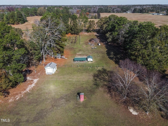 birds eye view of property featuring a rural view