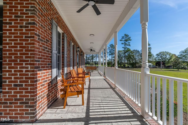 view of patio / terrace with a porch and ceiling fan