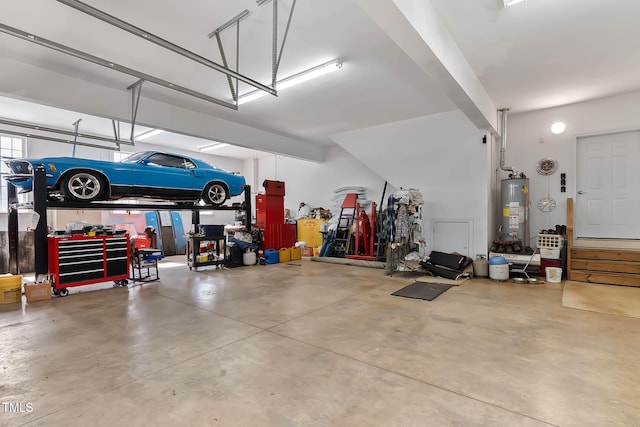 garage featuring gas water heater