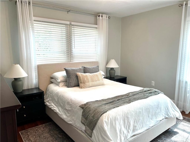 bedroom featuring wood finished floors