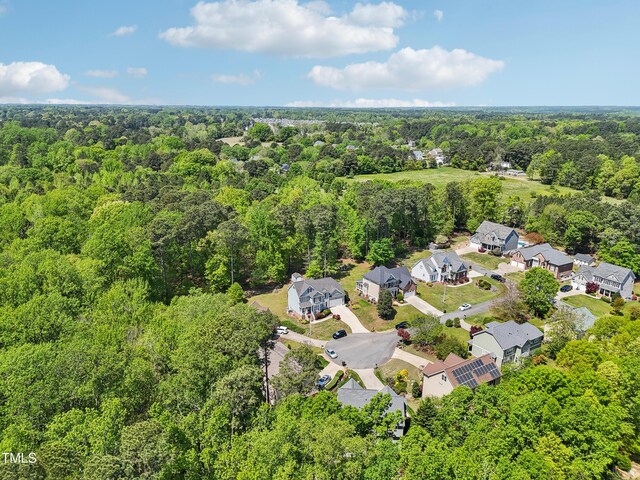 5708 Butter Churn Way, Fuquay Varina, NC 27526 - aerial view of property's location featuring a heavily wooded area and nearby suburban area