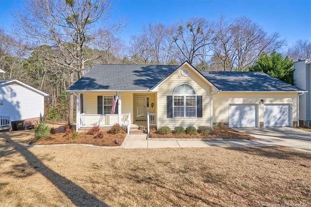 ranch-style home featuring a garage, covered porch, driveway, and roof with shingles