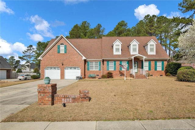 cape cod house with a front lawn, concrete driveway, an attached garage, crawl space, and brick siding