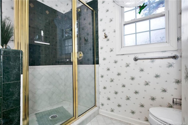 full bathroom with baseboards, toilet, a shower stall, and wallpapered walls