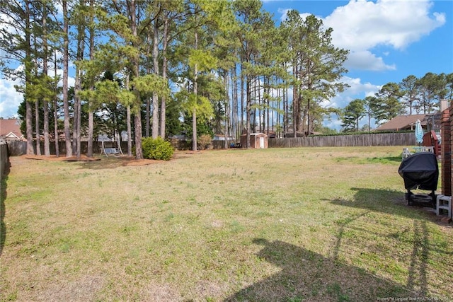 view of yard featuring a fenced backyard