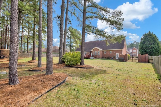 view of yard featuring fence