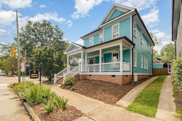 view of front of property featuring crawl space and a porch