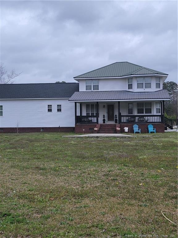41 Lenor Dr, Lumberton, NC 28360 - rear view of property with a porch and a lawn