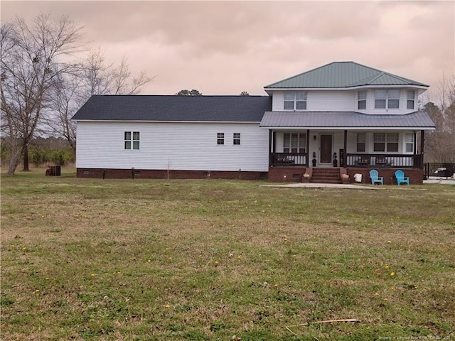 41 Lenor Dr, Lumberton, NC 28360 - rear view of property featuring crawl space, a lawn, and covered porch