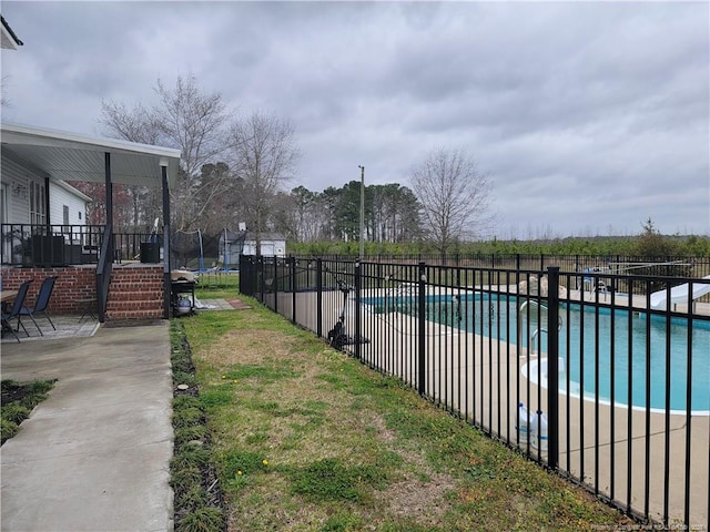 41 Lenor Dr, Lumberton, NC 28360 - view of yard featuring a fenced in pool, a patio, and fence