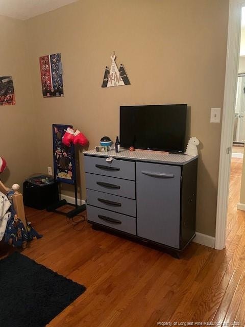 41 Lenor Dr, Lumberton, NC 28360 - bedroom with baseboards and light wood finished floors