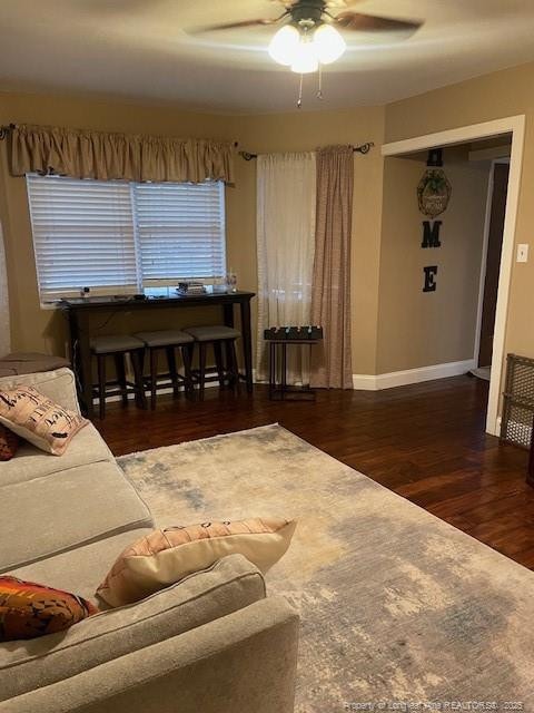 41 Lenor Dr, Lumberton, NC 28360 - living room with wood finished floors, baseboards, and ceiling fan