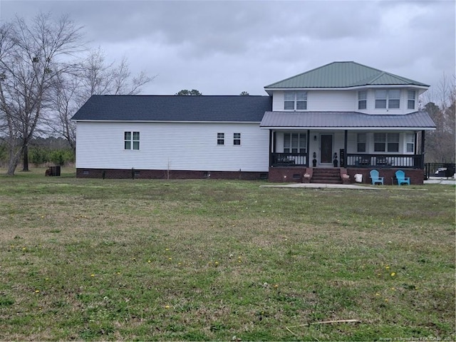41 Lenor Dr, Lumberton, NC 28360 - rear view of house featuring crawl space, a yard, and covered porch