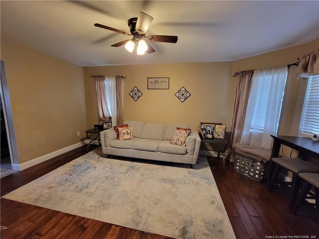 41 Lenor Dr, Lumberton, NC 28360 - living room featuring a ceiling fan, dark wood-style flooring, a wealth of natural light, and baseboards