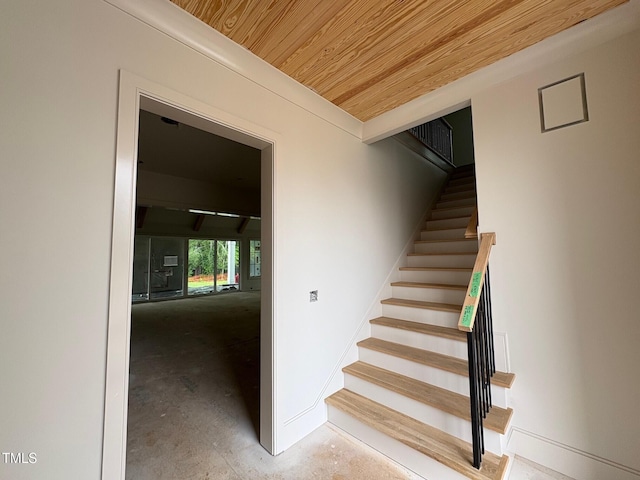 3405 Makers Cir, Raleigh, NC 27612 - stairway with concrete flooring and wooden ceiling