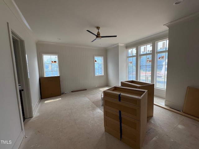 3405 Makers Cir, Raleigh, NC 27612 - spare room with ornamental molding, ceiling fan, and baseboards
