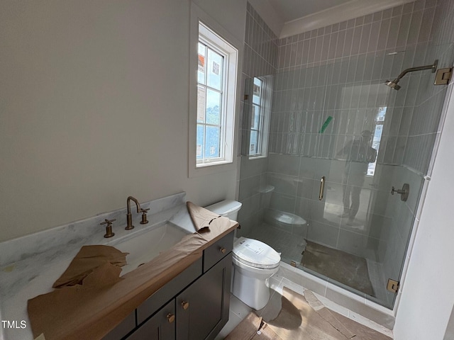 3405 Makers Cir, Raleigh, NC 27612 - bathroom with a shower stall, toilet, and vanity