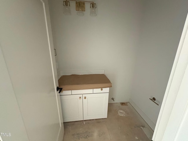 3405 Makers Cir, Raleigh, NC 27612 - bathroom with unfinished concrete floors and baseboards