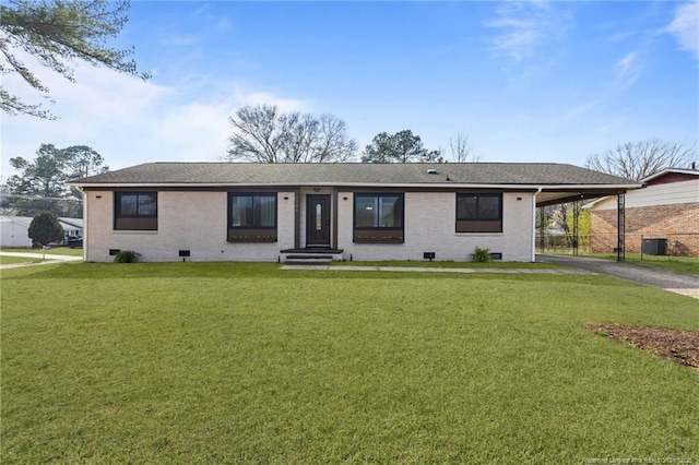 ranch-style house with aphalt driveway, crawl space, an attached carport, and a front yard