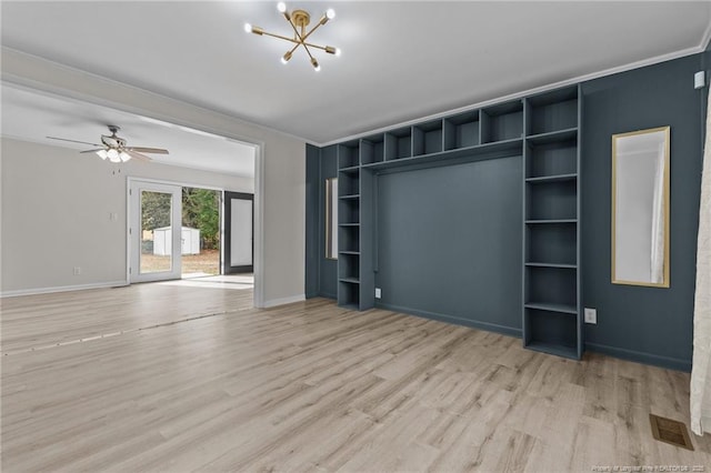 unfurnished living room with visible vents, light wood-style flooring, ceiling fan with notable chandelier, crown molding, and baseboards