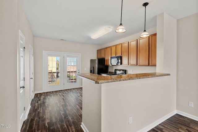 kitchen with dark wood-style floors, a peninsula, baseboards, pendant lighting, and black appliances