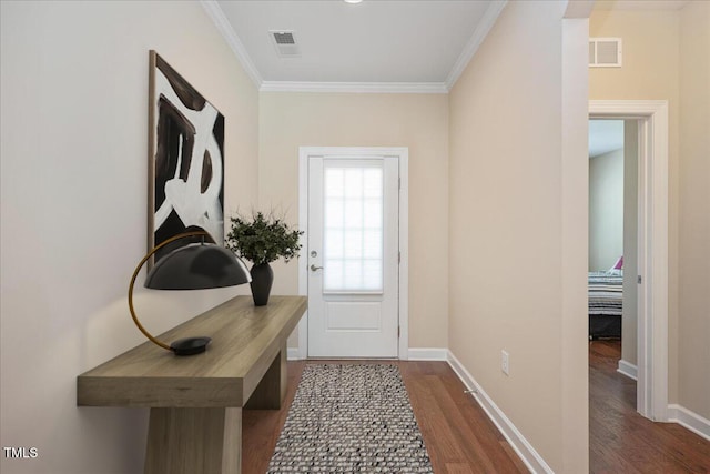 1013 Restoration Dr, Durham, NC 27703 - doorway to outside with wood finished floors, visible vents, and ornamental molding