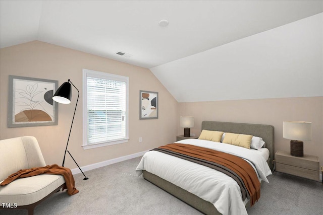 1013 Restoration Dr, Durham, NC 27703 - bedroom featuring baseboards, vaulted ceiling, visible vents, and carpet floors