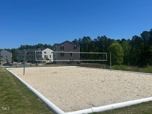 surrounding community featuring volleyball court