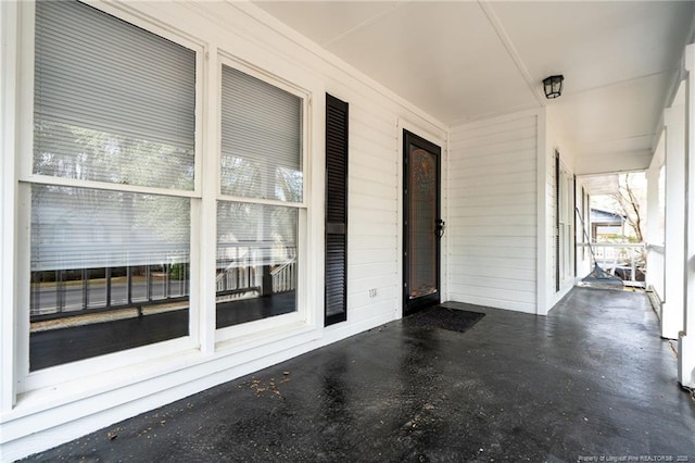 view of patio featuring covered porch