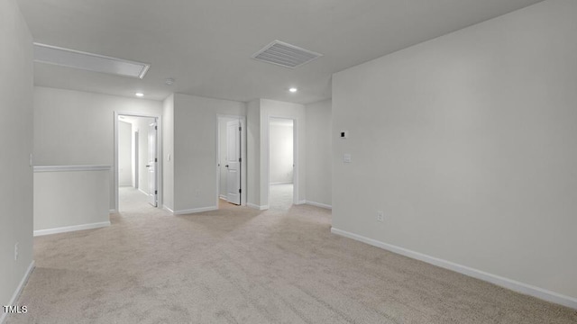 3040 Platinum Cir W, End, NC 27376 - empty room featuring attic access, recessed lighting, and light carpet