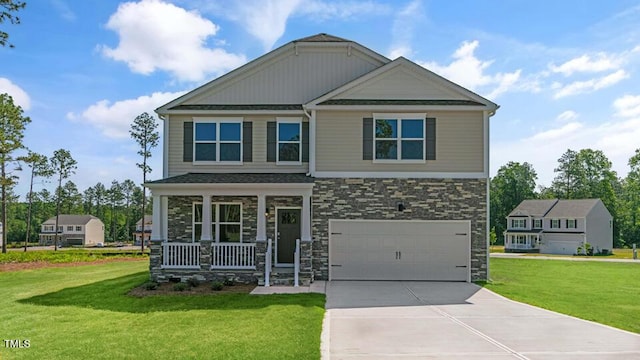 3040 Platinum Cir W, End, NC 27376 - craftsman inspired home with a porch, stone siding, driveway, a garage, and a front yard