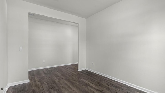 3040 Platinum Cir W, End, NC 27376 - spare room with dark wood finished floors and baseboards