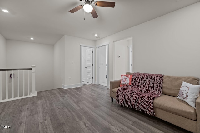 living room with ceiling fan, recessed lighting, wood finished floors, and baseboards