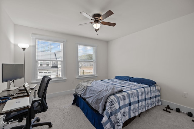bedroom featuring baseboards, a ceiling fan, and carpet floors