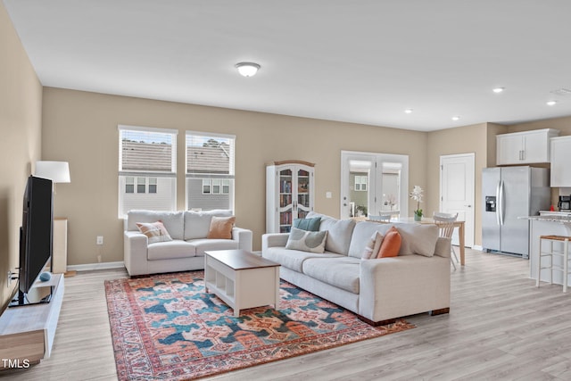 656 Dallas Rose Dr, Wendell, NC 27591 - living area with light wood-style flooring, recessed lighting, and baseboards