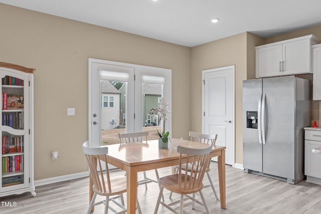 656 Dallas Rose Dr, Wendell, NC 27591 - dining area with light wood-style floors, baseboards, and recessed lighting