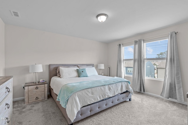 656 Dallas Rose Dr, Wendell, NC 27591 - bedroom with light carpet, baseboards, and visible vents