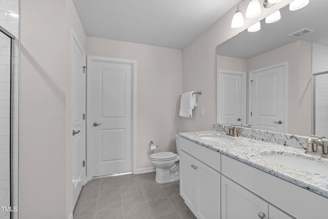 656 Dallas Rose Dr, Wendell, NC 27591 - full bath with a sink, visible vents, toilet, and tile patterned flooring