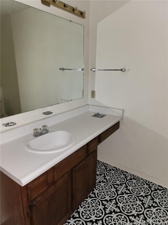 bathroom featuring vanity and tile patterned floors