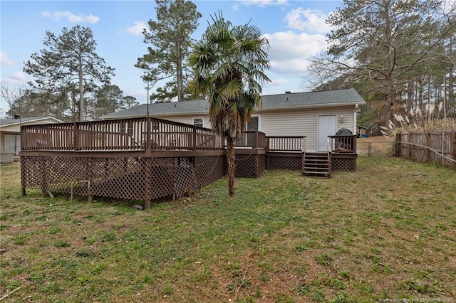 view of yard featuring a wooden deck and fence private yard