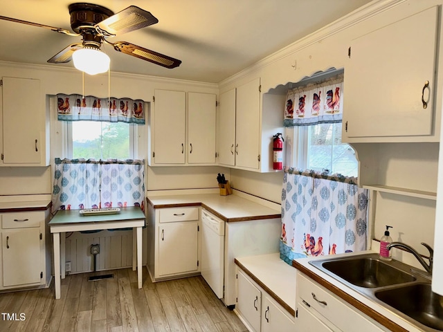 4715 Jacksontown Rd, Manson, NC 27553 - kitchen featuring dishwasher, a sink, light countertops, light wood-type flooring, and a ceiling fan