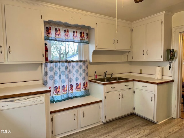 4715 Jacksontown Rd, Manson, NC 27553 - kitchen featuring white cabinets, white dishwasher, light wood-style flooring, and a sink