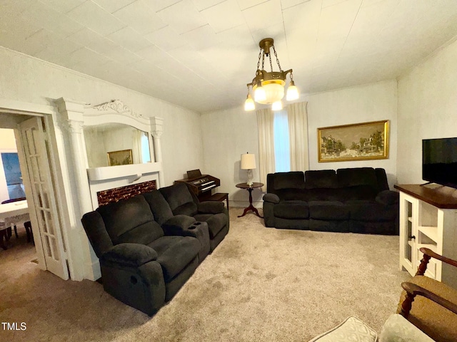 4715 Jacksontown Rd, Manson, NC 27553 - carpeted living room with a chandelier