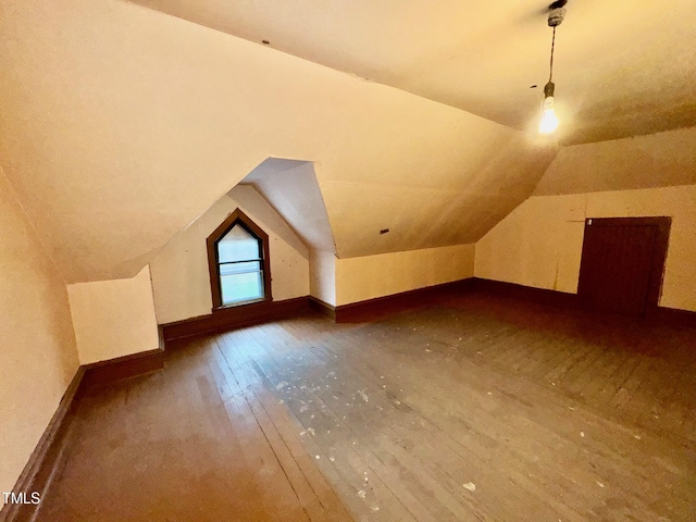 4715 Jacksontown Rd, Manson, NC 27553 - bonus room featuring baseboards, vaulted ceiling, and hardwood / wood-style flooring