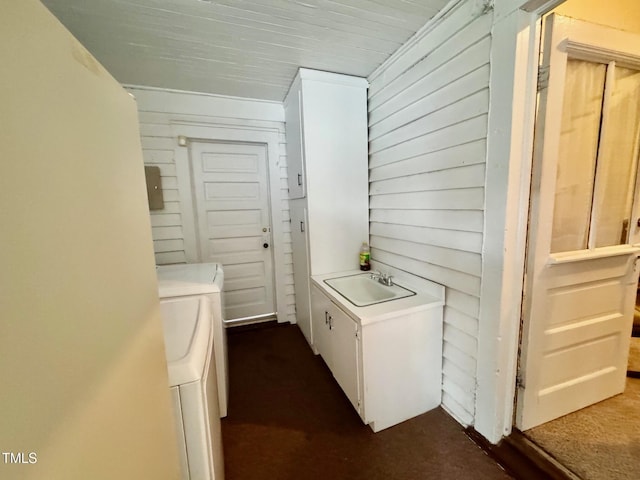 4715 Jacksontown Rd, Manson, NC 27553 - laundry room with laundry area, wood walls, washing machine and clothes dryer, and a sink