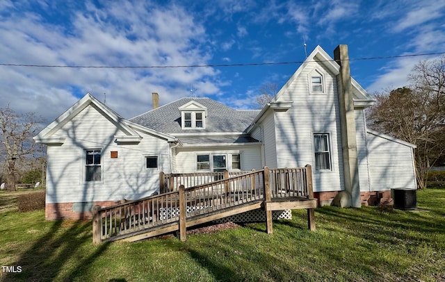 4715 Jacksontown Rd, Manson, NC 27553 - back of property featuring a yard, central AC, a wooden deck, and a chimney