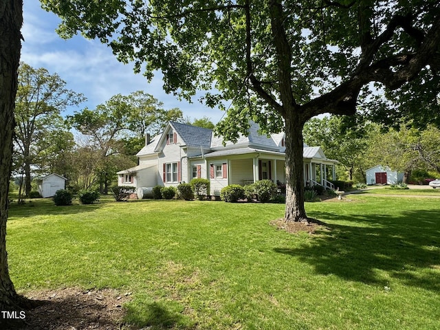 4715 Jacksontown Rd, Manson, NC 27553 - view of front of home featuring an outbuilding, a shed, and a front yard