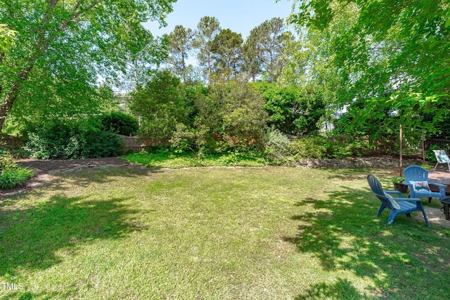 view of yard with fence